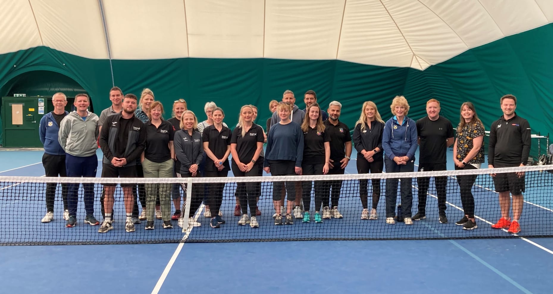 Photo of team at Cathie Sabin Community Tennis Centre